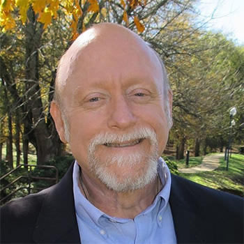 Bald white man with goatee