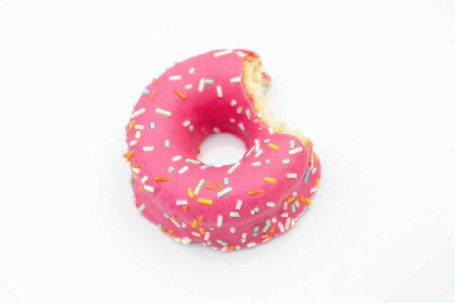 Pink donut with a bite out of it