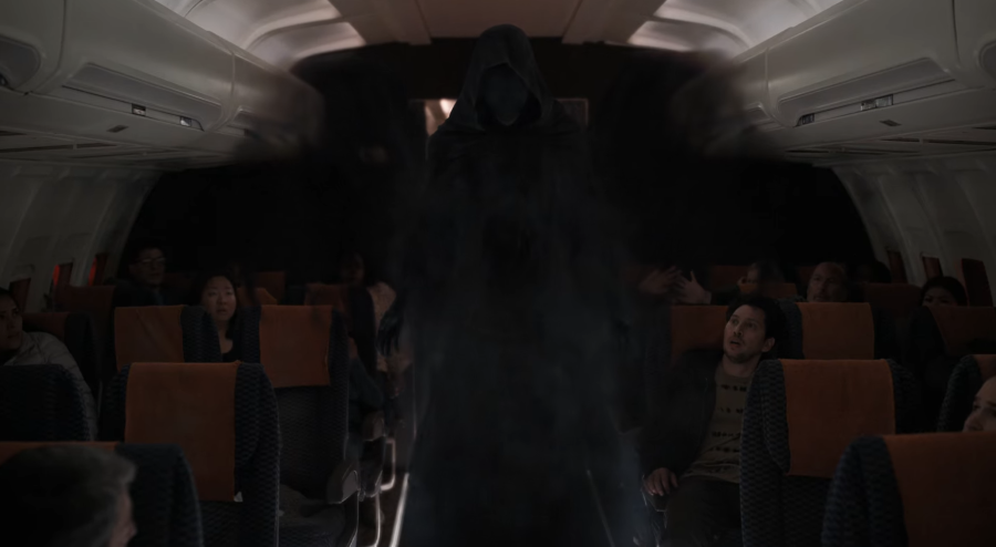 A dark shadowy figure in a plane