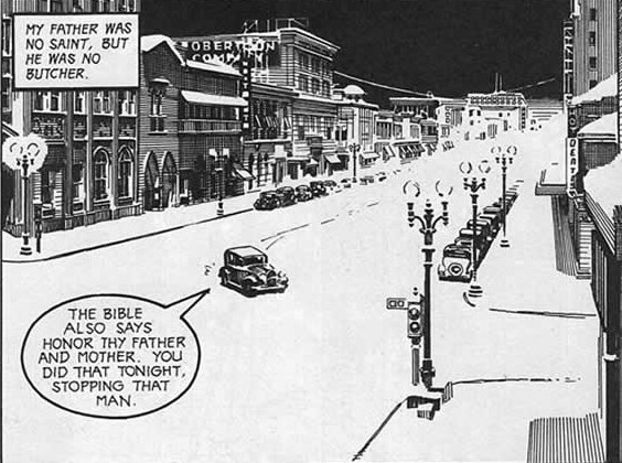 A car is driven through a snowy town road